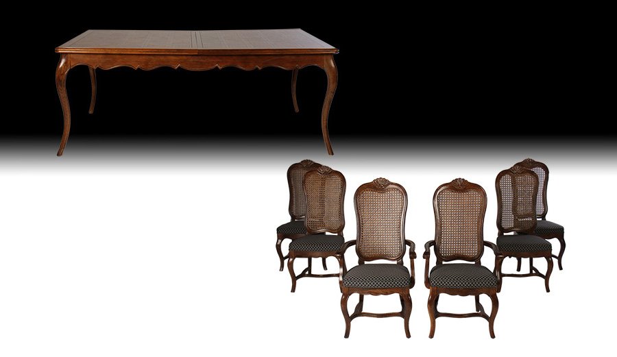 HENREDON DINING SET TABLE & 6 CHAIRS: A Henredon dining room set in the French taste including a dining table and six caned back chairs. Table having two leaves, each measuring 22.5". Ht: 4" Width: 22" Depth: 20" (arm chair)