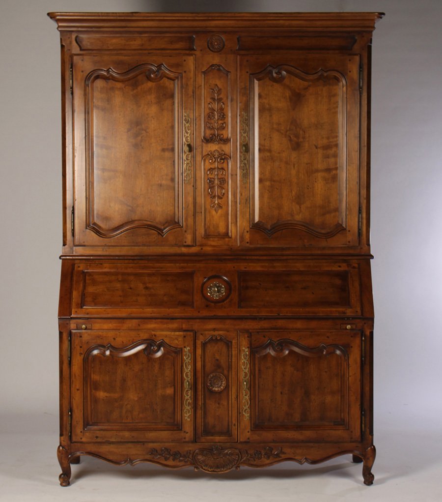 HENREDON COUNTRY FRENCH BLIND DOOR SECRETARY: A Henredon country French blind door secretary desk. The slant lid having a full interior and the lower compartment having three drawers.Ht: 90" Width: 65" Depth: 18"
