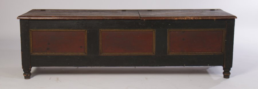 AMERICAN 19TH CENT. PAINT DECORATED CHEST: American nineteenth century paint decorated chest having two section top over raised paneled front and sides supported on turned feet. Ht: 20" Width: 66" Depth: 19"