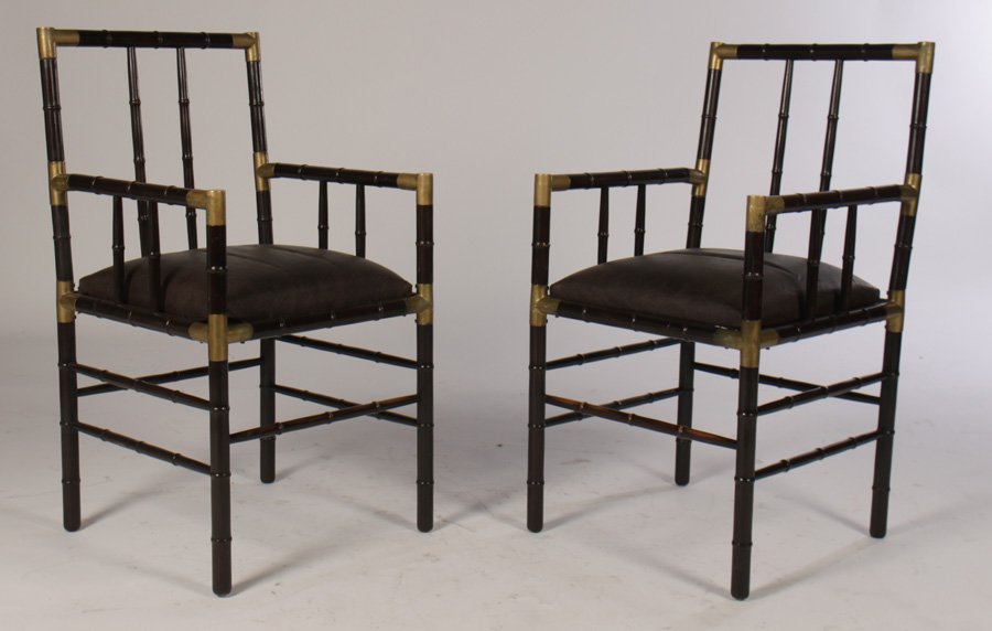 PR BILLY HAINES STYLE FAUX BAMBOO ARM CHAIRS 1960: A pair of Billy Haines style faux bamboo arm chairs with brass trim and slip seats circa 1960. Ht: 36" Width: 19" Depth: 20"