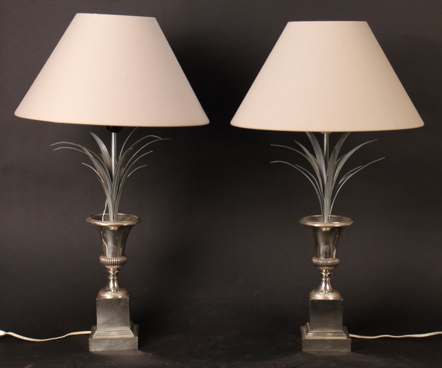 PR SIGNED MAISON CHARLES CHROME LAMPS: A pair of signed Maison Charles chrome lamps having leaf fans protruding from campana form urns circa 1950. Ht: 20"