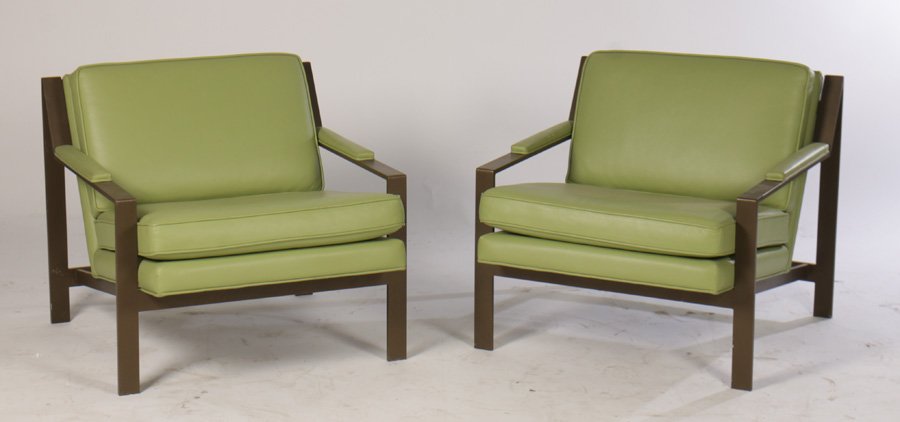 PR CY MANN LEATHER LOUNGE CHAIRS BRONZE FINISH: A pair of Cy Mann leather lounge chairs with open arms and bronze finish. Ht: 26" Width: 25.5" Depth: 32"