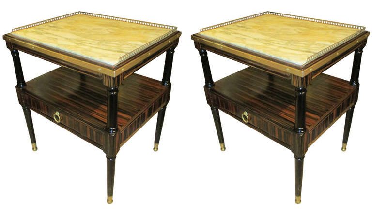 PAIR OF FAUX MACASSAR EBONY TABLES CIRCA 1950: Pair of faux macassar ebony tables with brass gallery circa 1950. Ht: 26.5" Width: 22" Depth: 18"