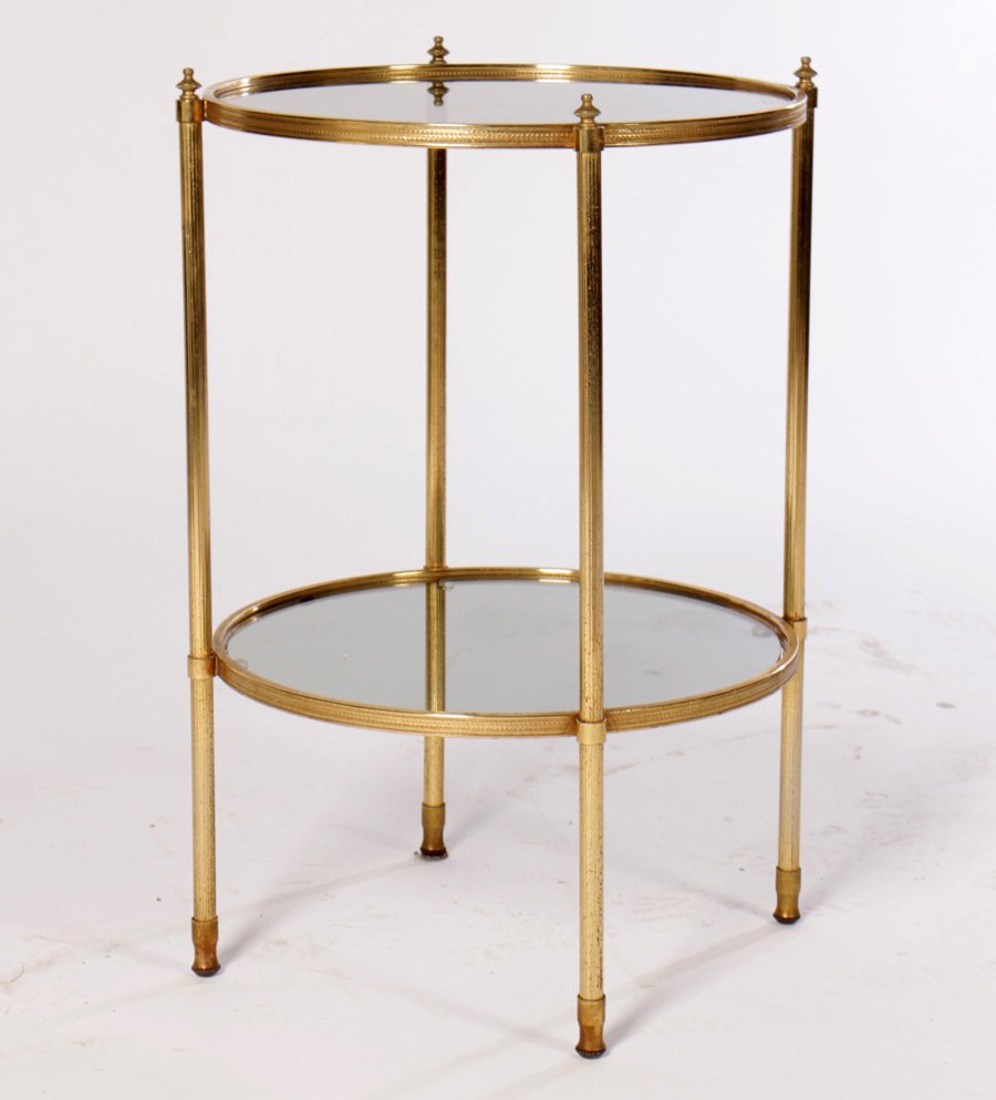 FRENCH BRASS PLATED 2 TIER GUERIDON 1960: A French brass plated two tiered gueridon circa 1960. Ht: 25" Dia: 16.5"