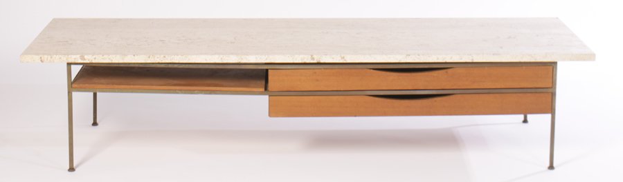 PAUL MCCOBB FOR CALVIN COFFEE TABLE 1950: A 'Paul McCobb for Calvin' coffee table having travertine top over two drawers supported on brass legs circa 1950. Ht: 15" Width: 72" Depth: 24"