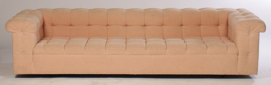 UPHOLSTERED DUNBAR WORMLEY SOFA 1970: An upholstered and button back tailored Dunbar sofa, Model 5407, design by Edward Wormley(American, 1907-1995) circa 1970.Ht: 21" Width: 102" Depth: 25" From a prominent Delaware estate. See lots 1 an