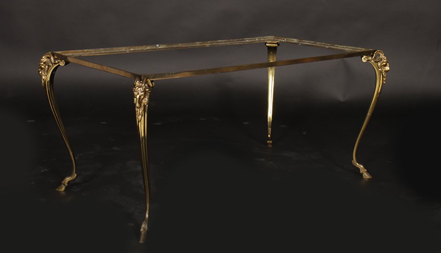 ITALIAN BRONZE RECTANGULAR COFFEE TABLE C.1950: Italian bronze rectangular coffee table base with ram's heads and hoofed feet circa 1950. Ht: 17" Width: 38" Depth: 23"