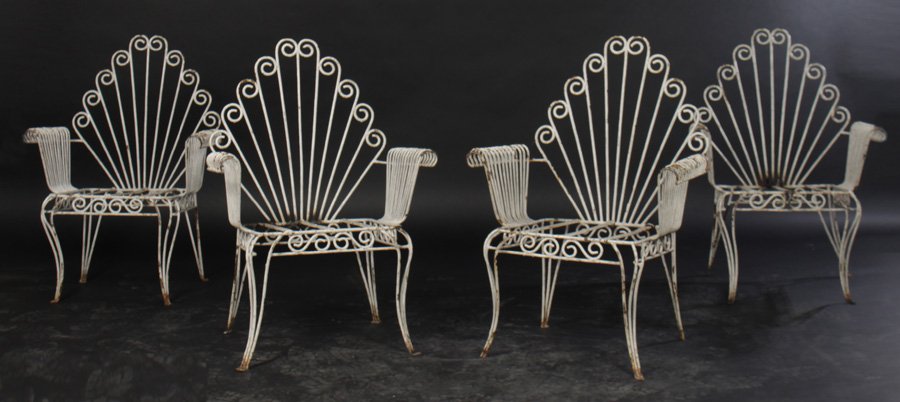 SET FOUR ART DECO WROUGHT IRON GARDEN CHAIRS 1930: A set of four Art Deco wrought iron garden chairs having fan form back and rolled arms supported on tapering legs circa 1930. Ht: 35" Width: 24" Depth: 17"