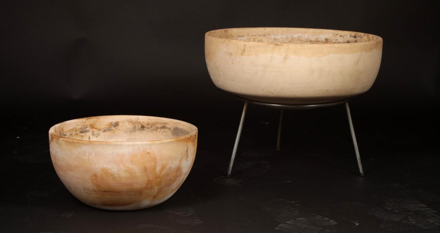 2 20TH C ARCHITECTURAL POTTERY PLANTERS IRON BASE: Two twentieth century Architectural Pottery bowl form planters, one raised on iron base. Ht: 18" Width: 21.5"