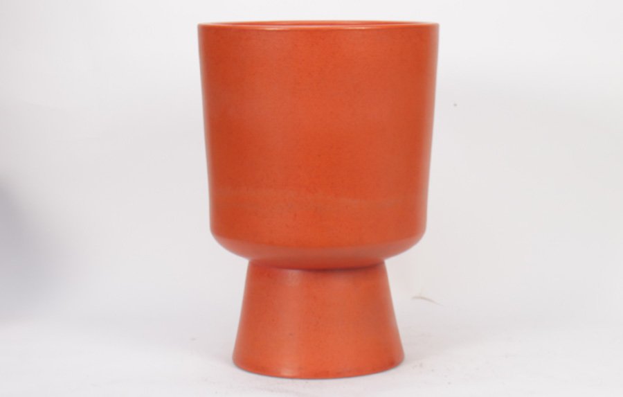 MALCOLM LELAND BISQUE FOOTED GARDEN PLANTER 1950: A rare orange Malcolm LeLand for Bisque Architectural Pottery garden footed planter circa 1950. Ht: 19.75" Dia: 13.5"