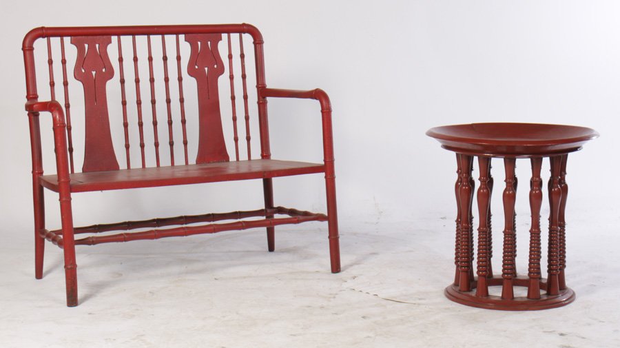 2 PC LOT RED PAINTED WOOD BENCH SIDE TABLE 1930: A two piece lot of red painted furniture including a faux bamboo carved wood bench and a side table supported on turned legs circa 1930. Ht: 36" Width: 45" Depth: 19"