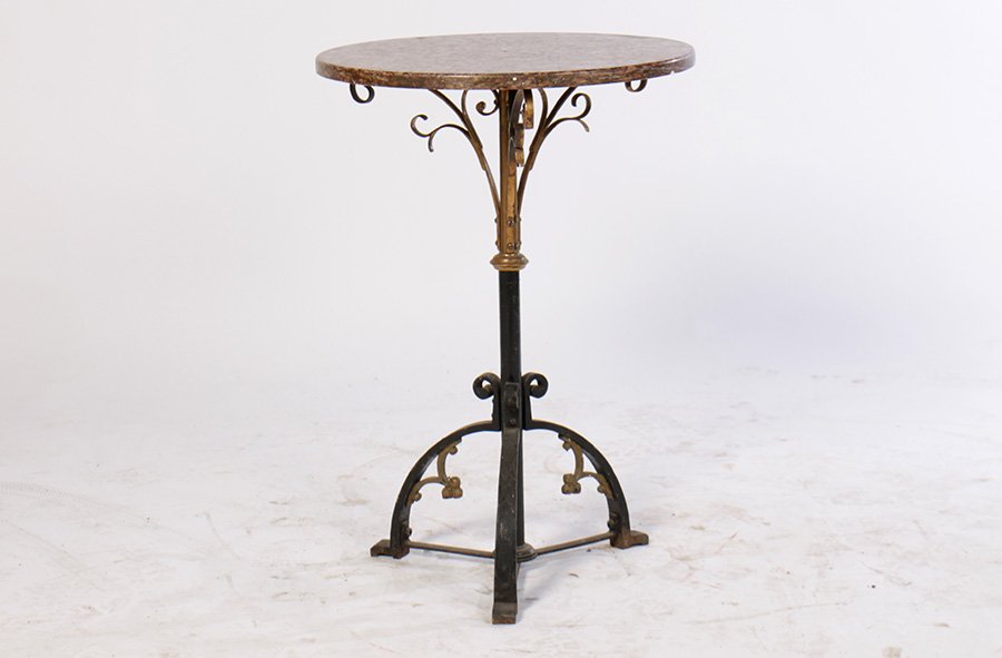 WROUGHT IRON BRASS GOTHIC GARDEN GUERIDON 1920: A nice wrought iron and brass gothic style garden gueridon having marble top supported by central column with scrolling decoration circa 1920. Ht: 31" Dia: 21.5"
