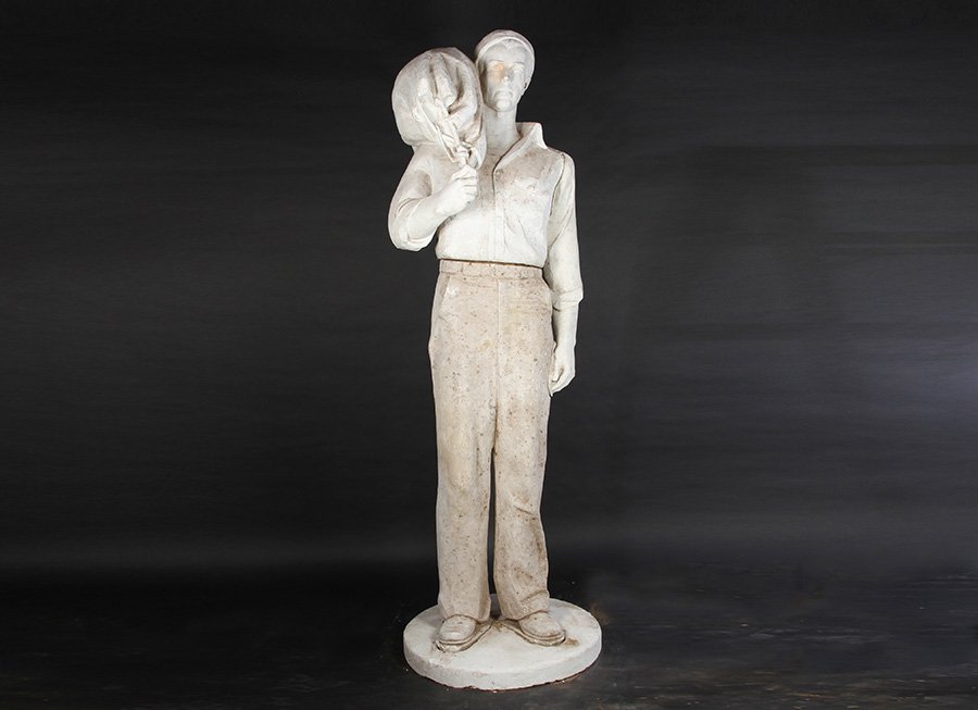 CHARLES RUDY PLASTER FIGURE STANDING SAILOR: A monumental Charles Rudy plaster figure of a standing sailor with wool cap and seaman's travel bag. The figure was orignally designed as the model for the Sun Seaman's Memorial dedicted in 1949 at th