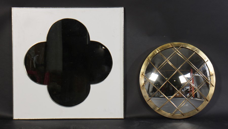 2 MIRRORS BRASS MARITIME CONVEX CLOVER STILL: A lot of two mirrors including a brass maritime inspired convex mirror with cage front and a painted clover leaf still mirror. Ht: 36" Width: 36" (largest)
