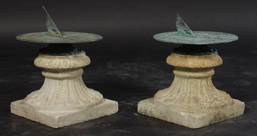 PAIR BRONZE SUNDIALS MOUNTED ON CAST STONE BASES: A pair of bronze sundials mounted on cast stone bases. Ht: 15" Dia: 11"