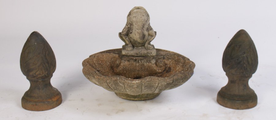 PAIR CAST IRON FINIALS FROG FOUNTAIN C.1950: A lot of garden items including a pair of cast iron finials, cast stone frog fountain, and shell form basin circa 1950. Ht: 7" Width: 24" Depth: 22" (basin)