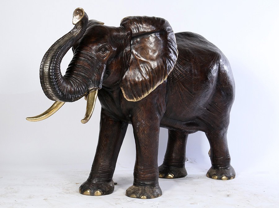 BRONZE ELEPHANT GARDEN FOUNTAIN UPRAISED TRUNK: A good bronze elephant garden fountain having upraised trunk and polished tusks. Ht: 48" Width: 24" Depth: 80"