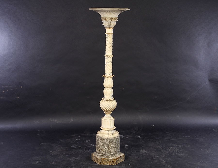 CARVED ALABASTER TORCHIERE FLARED SHADE C.1900: A turn of the century carved alabaster torchiere having flared shade circa 1910. Supported by multiple piece carved column with acanthus twist and fluted decoration. Ht: 56" Dia: 17"