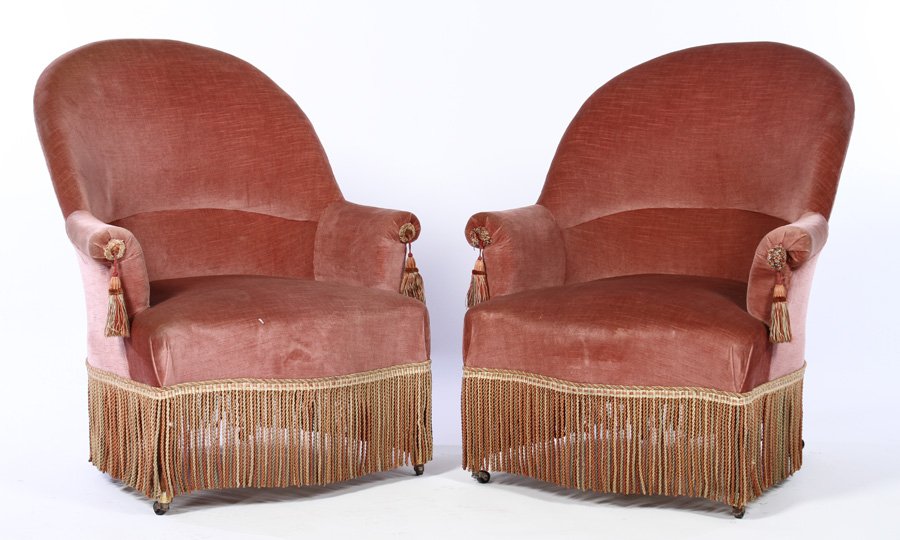 PAIR NAPOLEON III ARM CHAIRS FRINGE DESIGN 1880: A pair of Napoleon III arm chairs with fringe and tassel design circa 1880. Ht: 36" Width: 30.5" Depth: 33"
