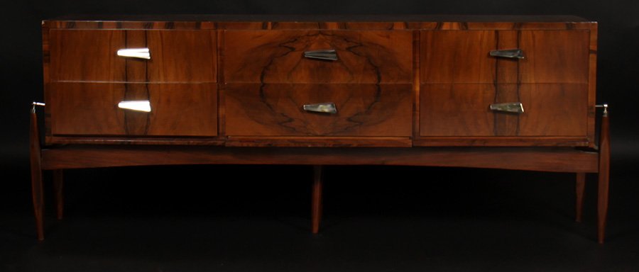 ITALIAN MID CENTURY MODERN CREDENZA C.1960: Good Italian mid century modern credenza having six drawers with central bookmatched figured veneer all supported on tapering legs circa 1960. Ht: 27" Width: 66" Depth: 16.5"