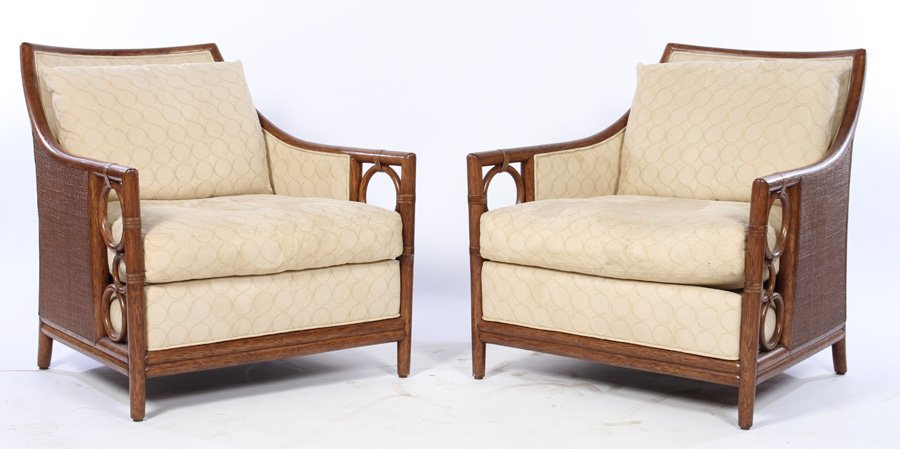 LARGE PAIR MCGUIRE RATTAN UPHOLSTERED ARMCHAIRS: An oversized pair of McGuire rattan and upholstered armchairs. Ht: 32" Width: 32" Depth: 32"