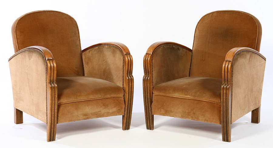PAIR FRENCH ART DECO CLUB CHAIRS 1940: A pair of French Art Deco club chairs having shaped arms with carved stiles and nailhead decoration circa 1940. Seat height: 12" Ht: 31" Width: 25" Depth: 28"