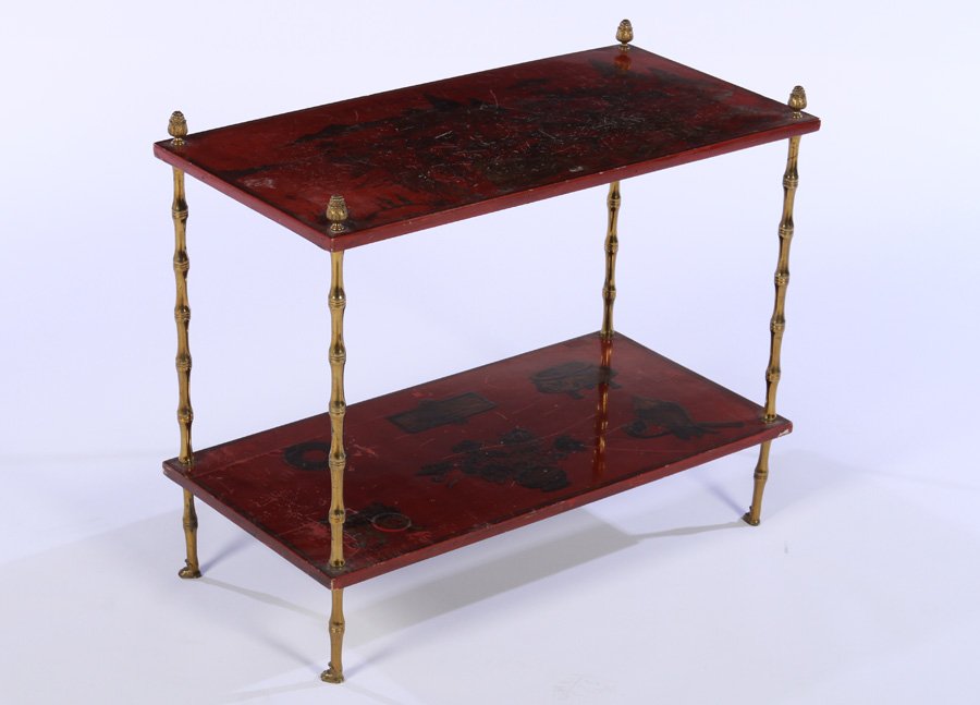 DAVID HICKS STYLE 2 TIER SIDE TABLE 1940: A David Hicks style chinoiserie decorated two tier side table having overall oxblood and gilt decoration circa 1940. Supported by bronze faux bamboo legs. Ht: 23" Width: 27.5" Depth: 14"