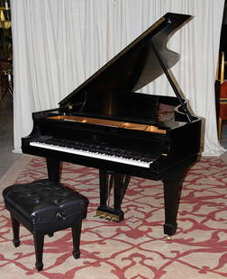 STEINWAY & SONS SATIN EBONY MODEL B PIANO #535450: A Steinway and Sons satin ebony Model B piano with adjustable matching bench, known as the "Music Room Grand", serial #535450. This piano came from the living estate of American writer, pianist, and