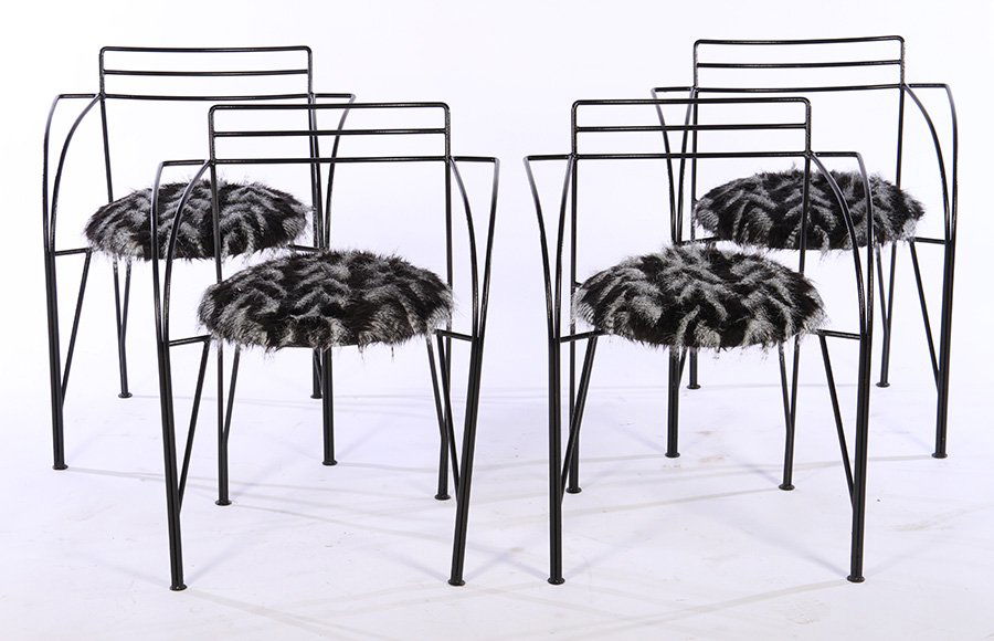 SET OF 4 PASCAL MOURGUE WROUGHT IRON CHAIRS: A set of four Pascal Mourgue wrought iron chairs with feather form upholstered seats. Ht: 29" Width: 24" Depth: 20"