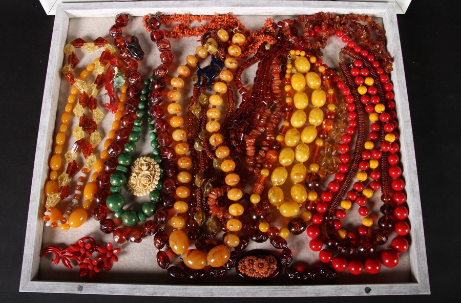SHADOW BOX WITH 18 BEAD NECKLACES 6 PINS 1960: A shadow box containing eighteen bead necklaces and six plastic figural pins circa 1960.