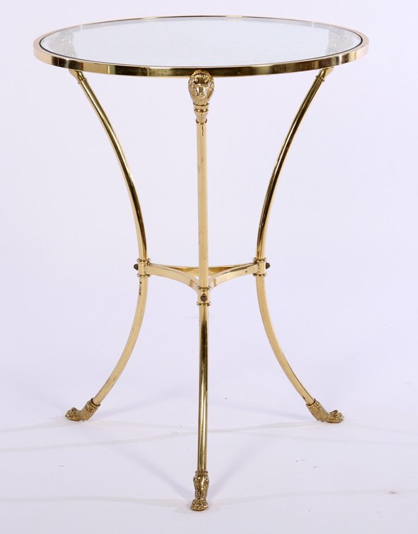 EMPIRE STYLE BRONZE GUERIDON GLASS TOP PAW FEET: An Empire style bronze gueridon having glass top and lion decorated legs with paw feet. Ht: 27" Dia: 22"
