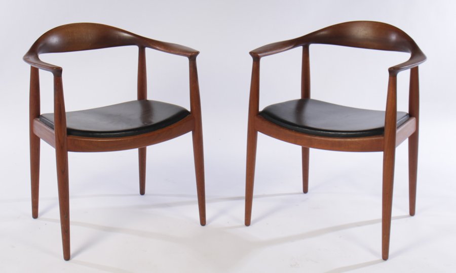 PAIR HANS WEGNER FOR JOHANNES HANSEN CHAIRS 1960: A good pair of Hans Wegner for Johannes Hansen branded armchairs with upholstered cushion seats circa 1960. Ht: 30" Width: 25" Depth: 18" Dia: Seat Ht 18"