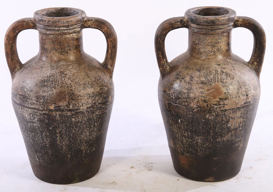 PAIR EARTHENWARE WINE VESSELS LABELED VINO ROSSO: A pair of earthenware wine vessels having two handles, each labeled 'Vino Rosso 1818' Ht: 24" Width: 14" Depth: 1"