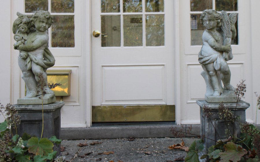 PAIR STONE PUTTI ON PEDESTALS CIRCA 1940 (1 of 5)