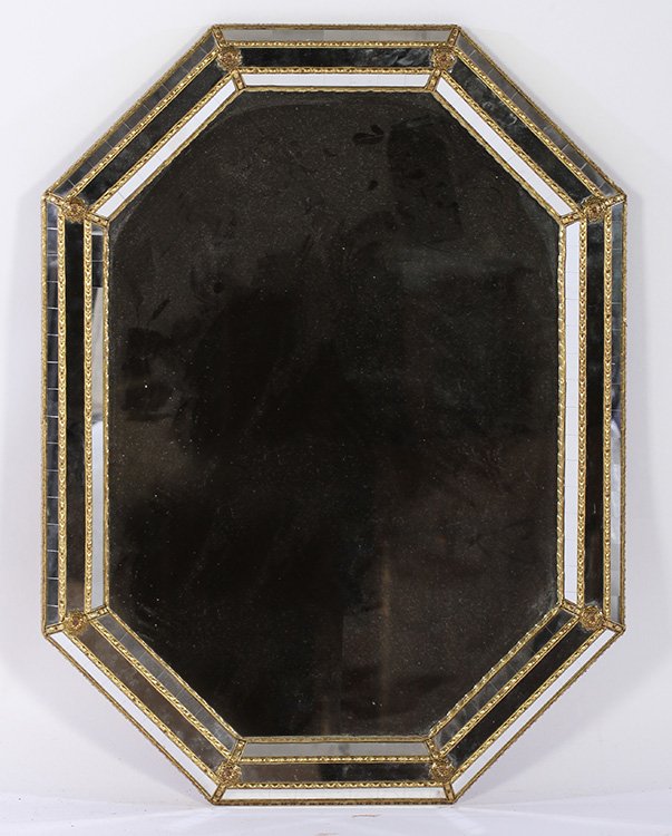 BRASS & GLASS OCTAGONAL MIRROR: A brass and glass octagonal mirror. Ht: 32" Width: 24"