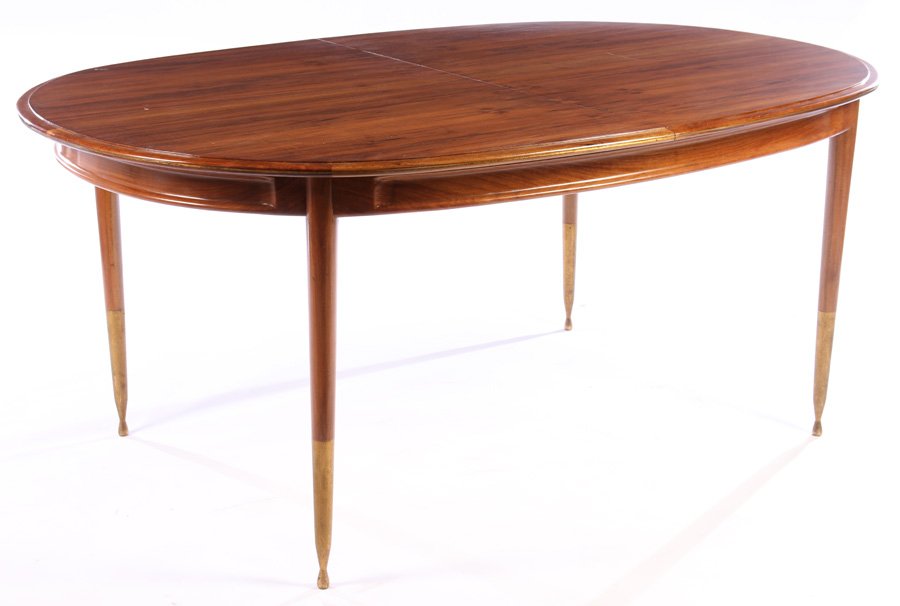 ITALIAN EXOTIC WOOD DINING TABLE 1 LEAF 1960: An interesting Italian exotic wood dining table having molded edge top with bronze line inlay circa 1960. All supported by turned legs with brass sabots. Having one leaf measuring 17.5" En suite with
