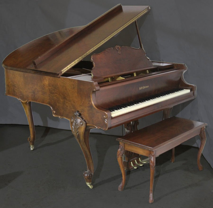 A 20TH CENTURY H.W. PERLMAN BABY GRAND PIANO: A twentieth century H.W. Perlman baby grand piano in the Louis XV style supported on carved cabriole legs. Along with a companion bench. Ht: 39" Wd: 55" Dpth: 60"