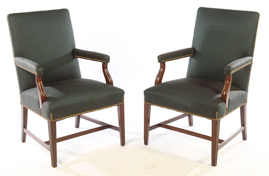 A 20TH CENTURY PAIR OF KITTINGER ARM CHAIRS: A twentieth century pair of Kittinger mahogany and upholstered arm chairs. Ht: 38.5" Wd: 24" Dpth: 23"