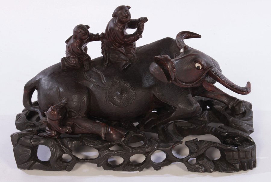 ANTIQUE CHINESE WOOD CARVING DEPICTING AN OX (1 of 6)