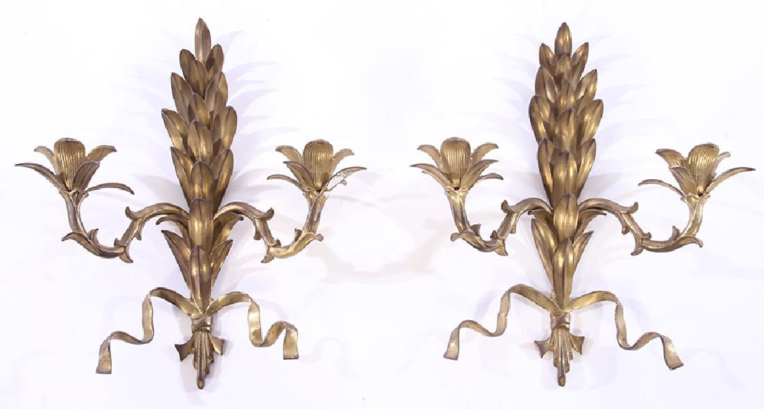 PAIR BRONZE CANDLE SCONCES STYLIZED DECORATION: A pair of bronze candle sconces having stylized leaf and flower decoration. Ht: 16.5" Width: 14.5"