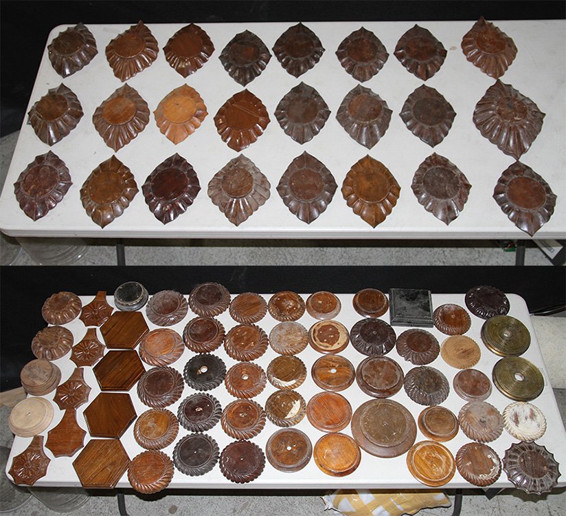 81 CANED WOOD SCONCE BACK PLATES CIRCA 1910: A collection of eighty one carved wood sconce back plates and other wood elements circa 1910. Ht: 11" Wd: 8" Dpth: 2"