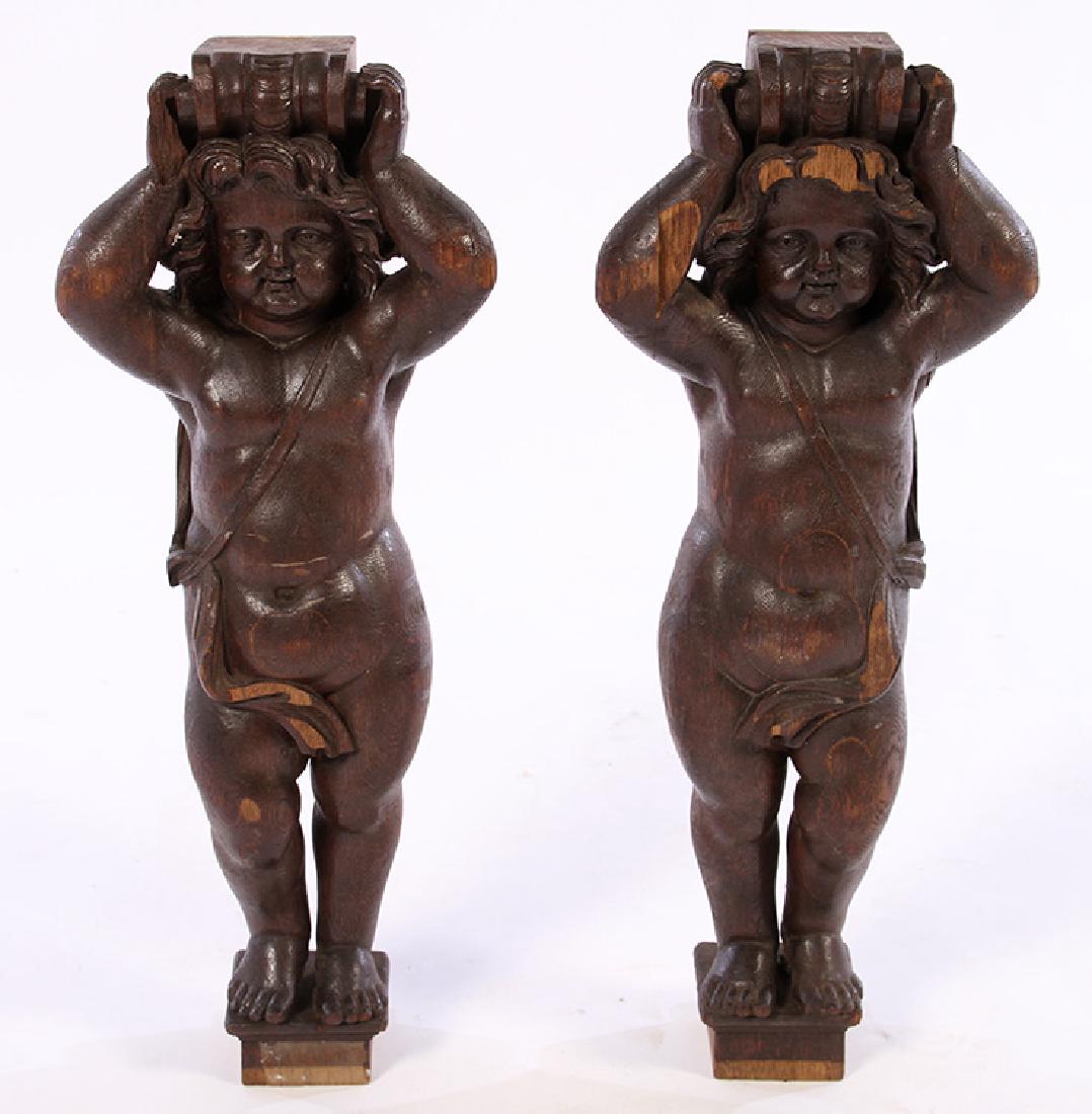 PAIR LATE 19TH CENT. CARVED OAK PUTTI (1 of 6)