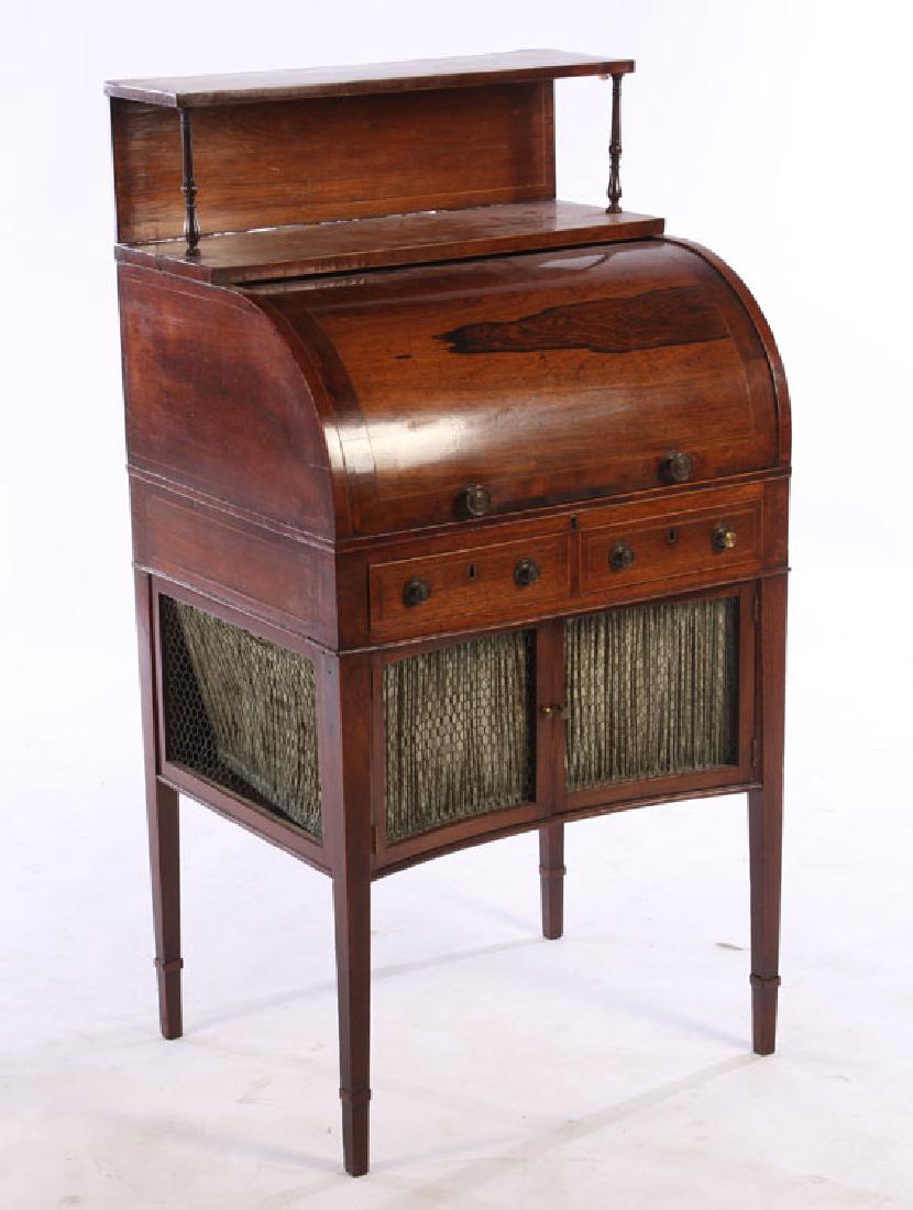 19TH CENT. ENGLISH GEORGE III CYLINDER DESK: A nineteenth century English George III cylinder desk having open shelf over fitted desk above two line inlaid drawers and two drawers. All supported on tapered legs. Ht: 46.5" Wd: 24" Dpth: 19"