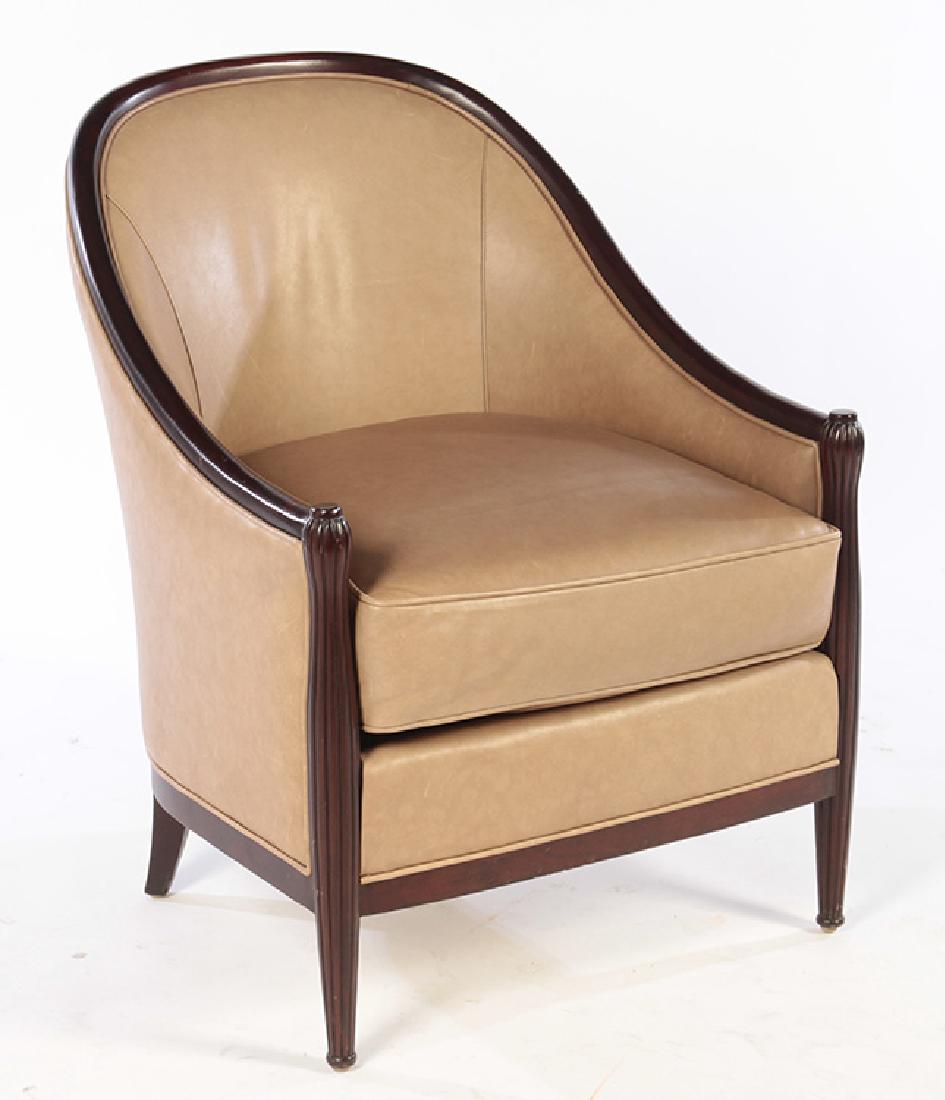 LABELED SCHUMACHER ART DECO LEATHER CLUB CHAIR: A labeled "Schumacher" Art Deco style leather upholstered club chair. Ht: 34" Wd: 26" Dpth: 25"