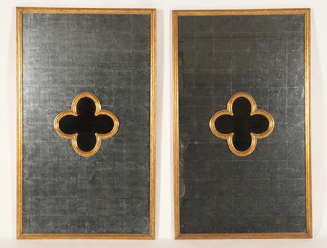 PAIR OF GILT MIRRORS WITH SILVERED GLASS FRAMING: A pair of labeled Bliss Studio gilt decorated mirrors with silvered glass framing central decoration. Ht: 50" Wd: 30"