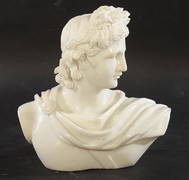 A CARVED WHITE MARBLE BUST OF APOLLO (1 of 5)
