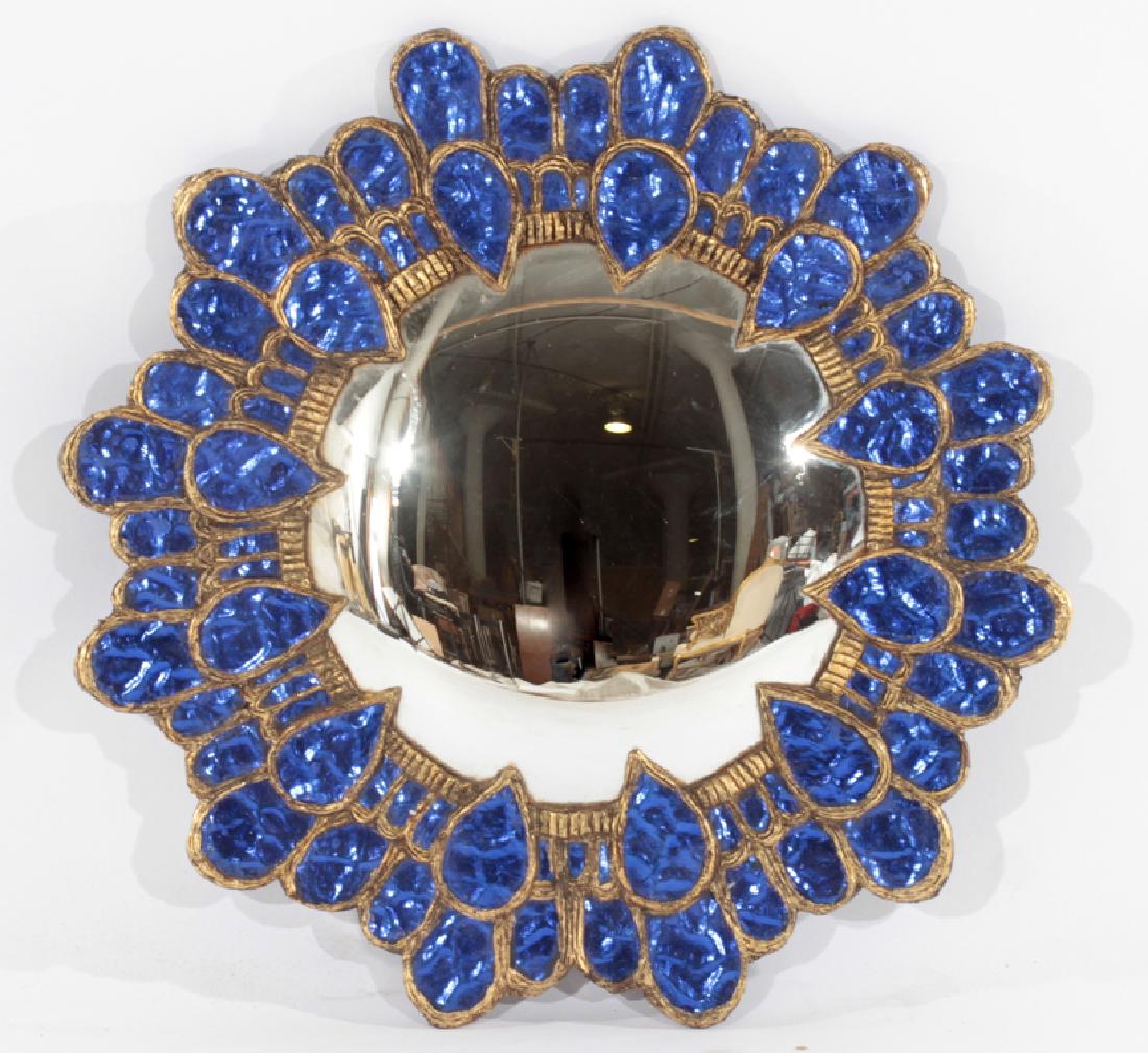 COBALT BLUE GLASS GILT RESIN WOOD MIRROR: An interesting cobalt blue glass gilt resin and wood mirror in the manner of Line Vautrin having overlapping petal design. Dia: 19.5"
