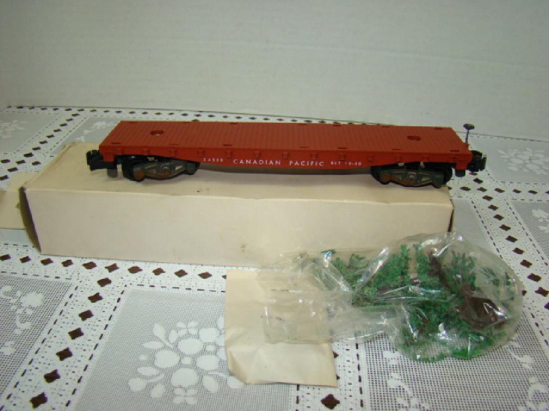 AMERICAN FLYER LINES CHRISTMAS TREE FLAT CAR NIB: AMERICAN FLYER LINES CHRISTMAS TREE FLAT CAR NIB- 24558- CANADIAN PACIFIC - CHRISTAMS TREES & FLATCAR STAKES IN ORIGINAL PACKAGING - BOX STAINING-DENTS-FLAP TEAR/MISSING