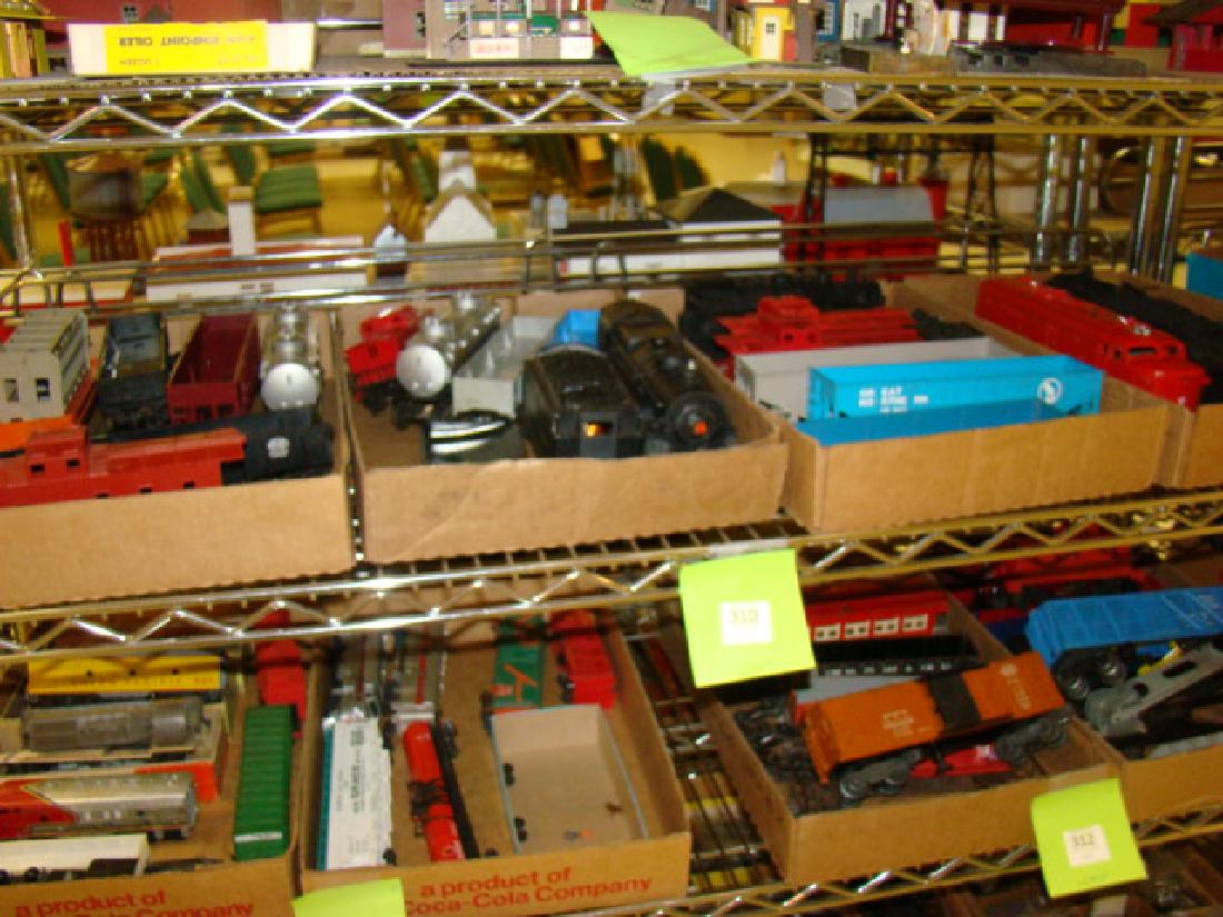 OVER 20 LIONEL TRAINS LOT: OVER 20 LIONEL TRAINS LOT -MANY ARE INTACT-LOCO-TENDERS-GANDOLAS-VARIOUS AGES AND TYPES-AS-IS