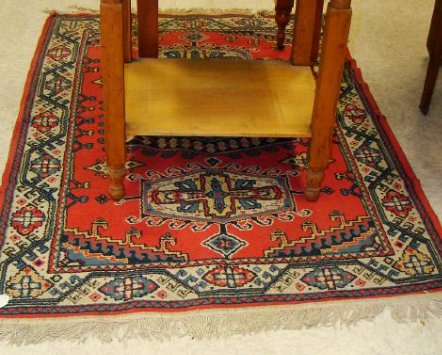 RED PATTERNED PERSIAN STYLE RUG (1 of 3)